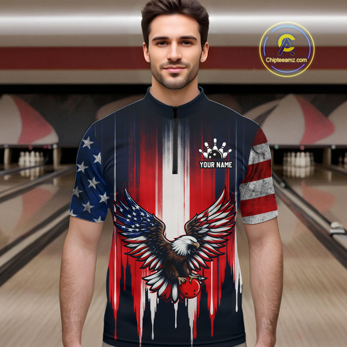 Man wearing a bowling shirt with an eagle design in a bowling alley.