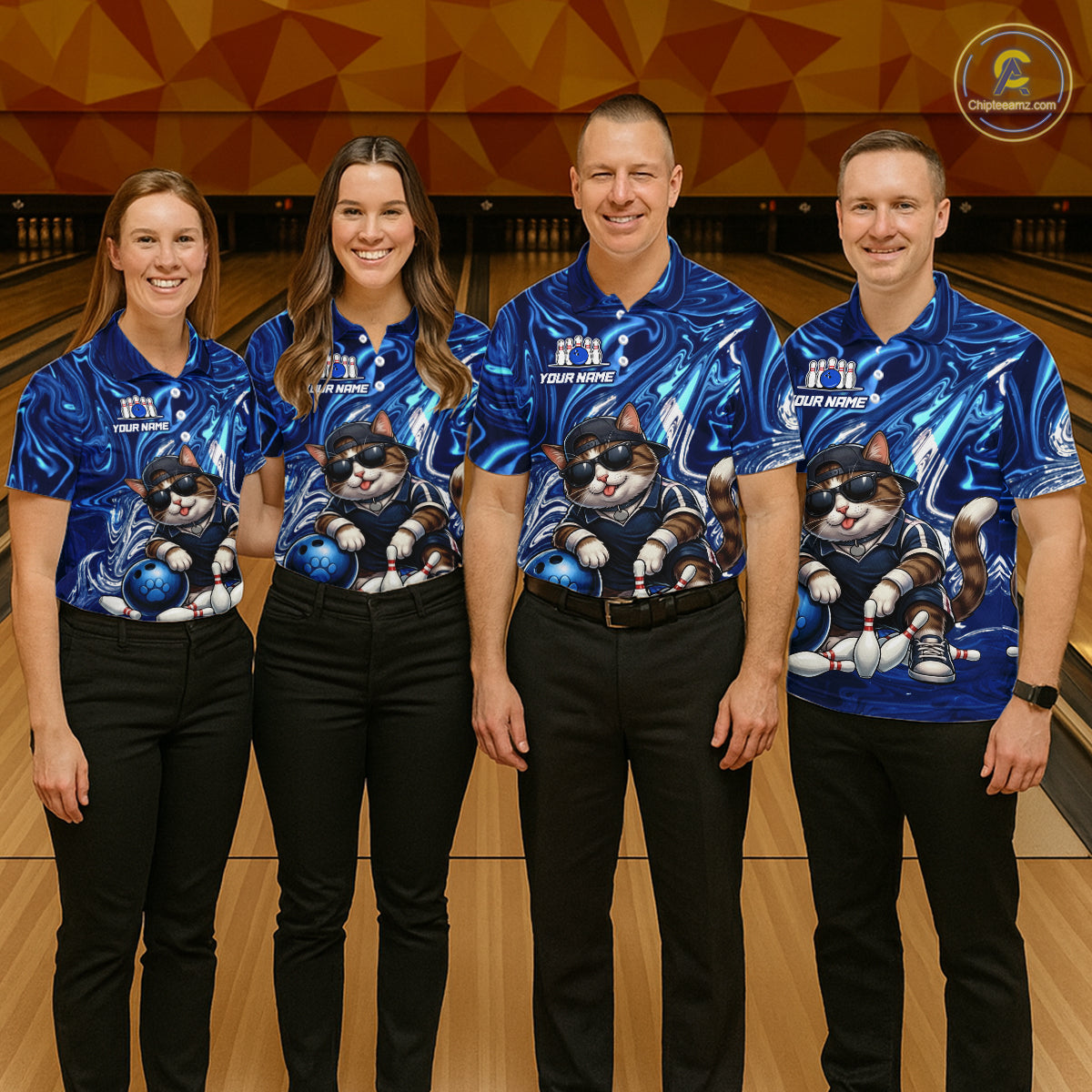Four people wearing matching blue bowling shirts with a cat design on a bowling alley.