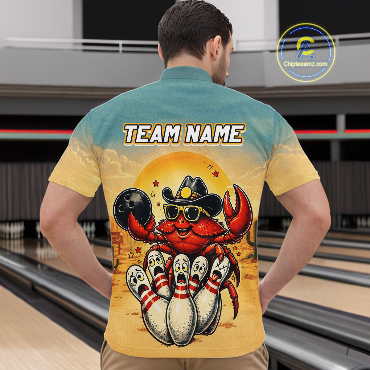 Person wearing a shirt with a colorful design of a crab bowling at a bowling alley.