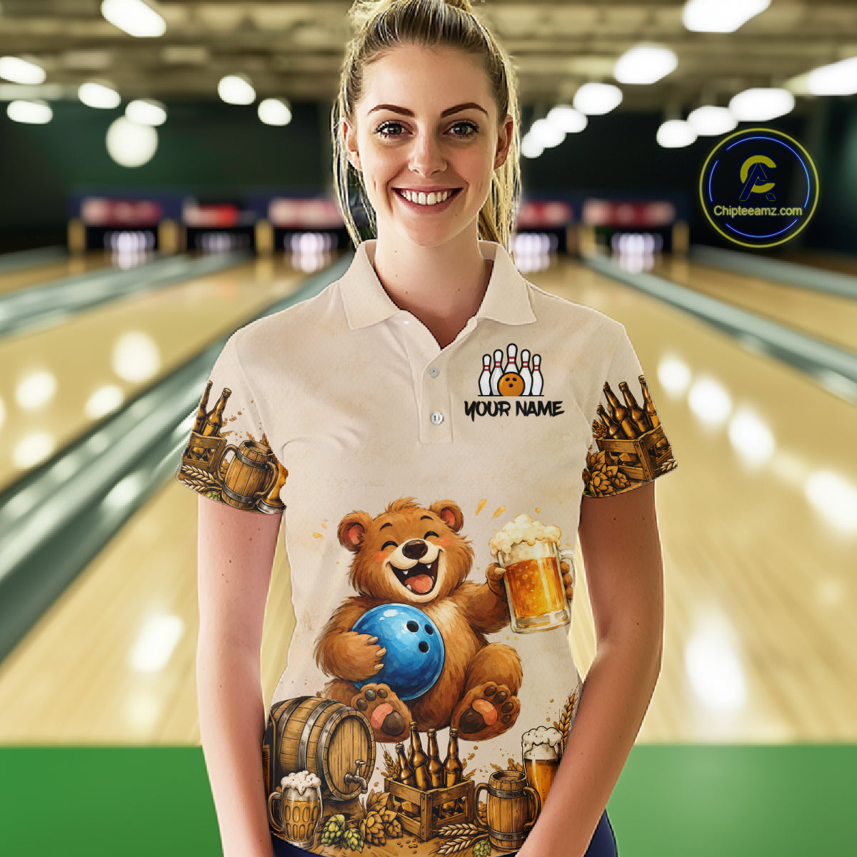 Person wearing a bowling-themed shirt with a bear design in a bowling alley.