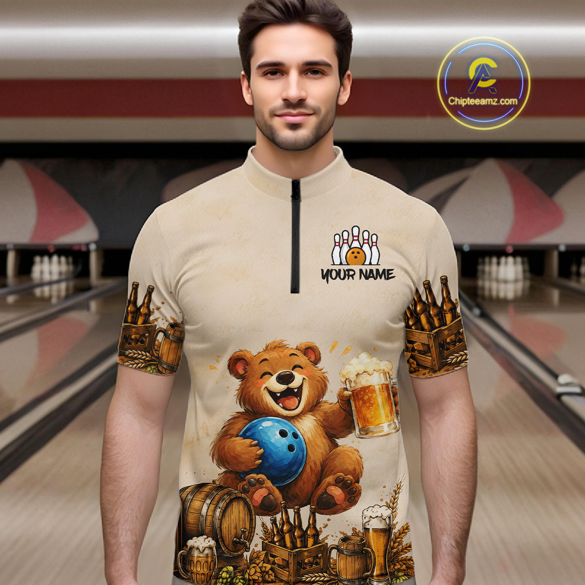 Man wearing a quarter-zip jersey with a bear holding a bowling ball and beer design in a bowling alley.
