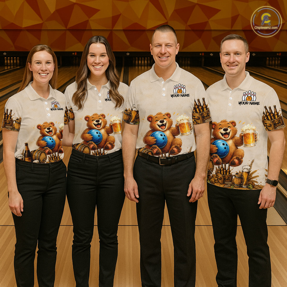 Four people wearing matching polo shirts with a bear and beer design in a bowling alley.