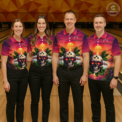 Four people wearing matching shirts with a skull design in a bowling alley.