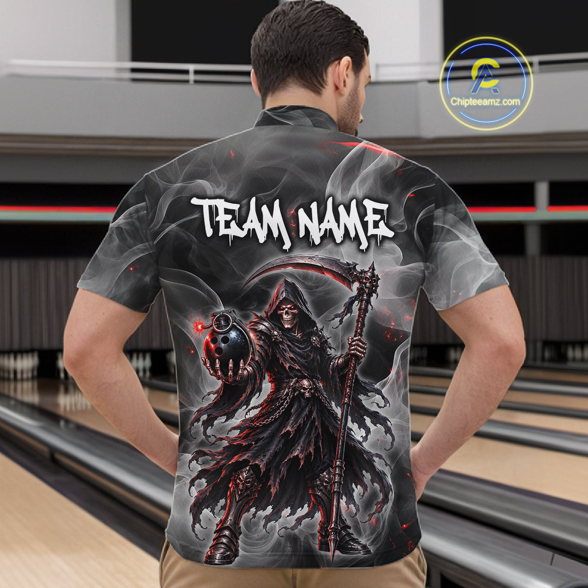 A man viewed from behind wearing a short-sleeve bowling shirt with a large Grim Reaper graphic and the text 'TEAM NAME' on the back, standing in front of bowling lanes.
