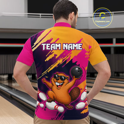 Person wearing a colorful bowling shirt with a cartoon beaver design in a bowling alley.