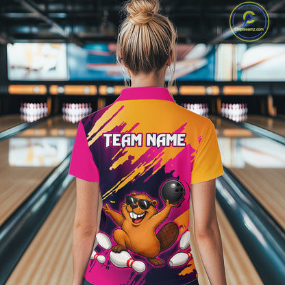 Person wearing a colorful bowling shirt with a team name design in a bowling alley.