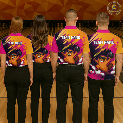 Four people wearing matching bowling shirts with a team name on a bowling alley.