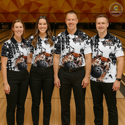 Four people in matching bowling shirts with a dog design on a bowling alley.