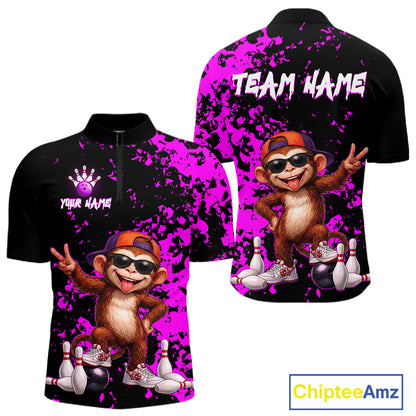 Front and back views of a black short-sleeve zip-up polo shirt with a bright purple paint splatter design and a cartoon monkey wearing sunglasses and an orange cap, with customizable text areas on the chest and back.