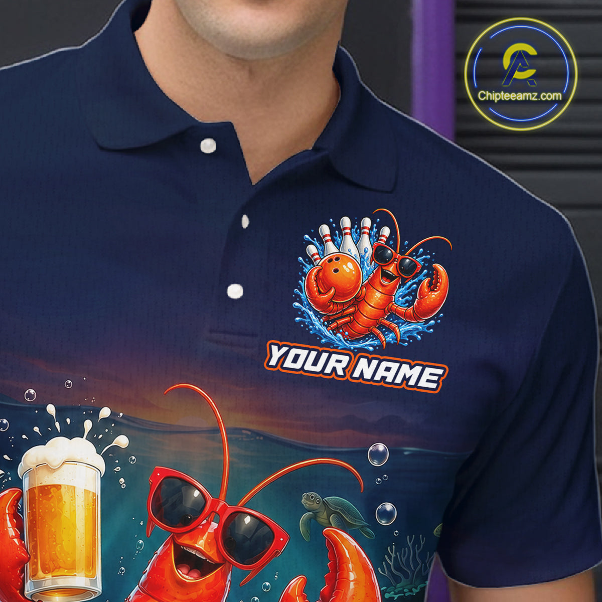Navy blue polo shirt with a colorful lobster design and 'Your Name' text on a dark background.