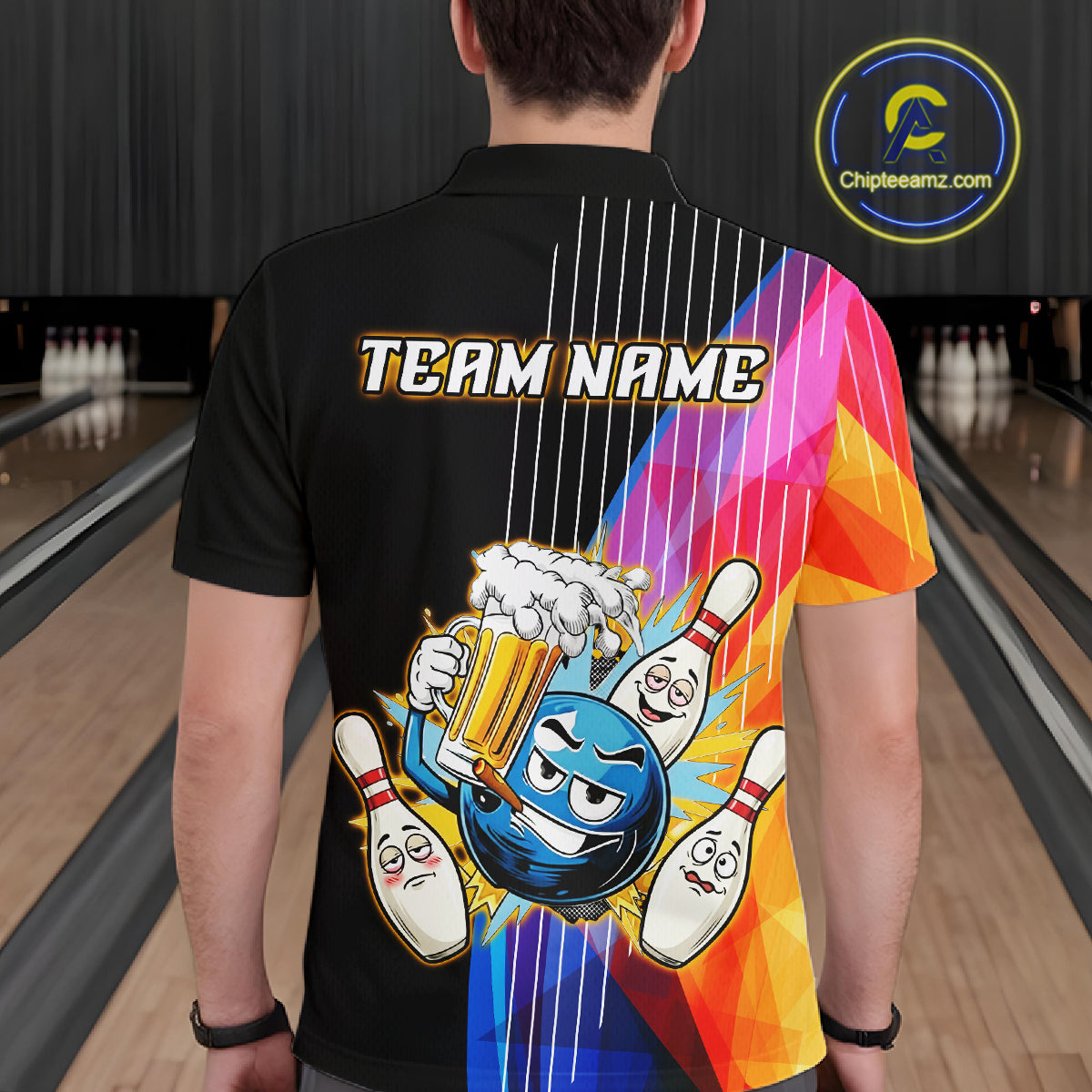 Person wearing a colorful bowling-themed shirt with 'Team Name' text in a bowling alley.