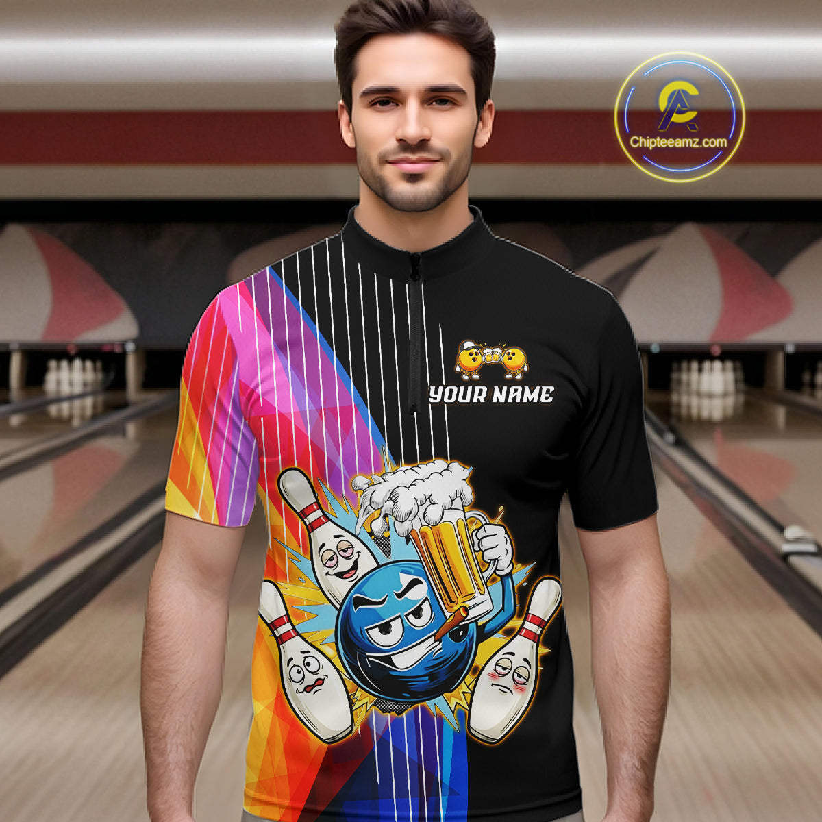 Man wearing a black bowling shirt with colorful design and 'Your Name' text in a bowling alley.