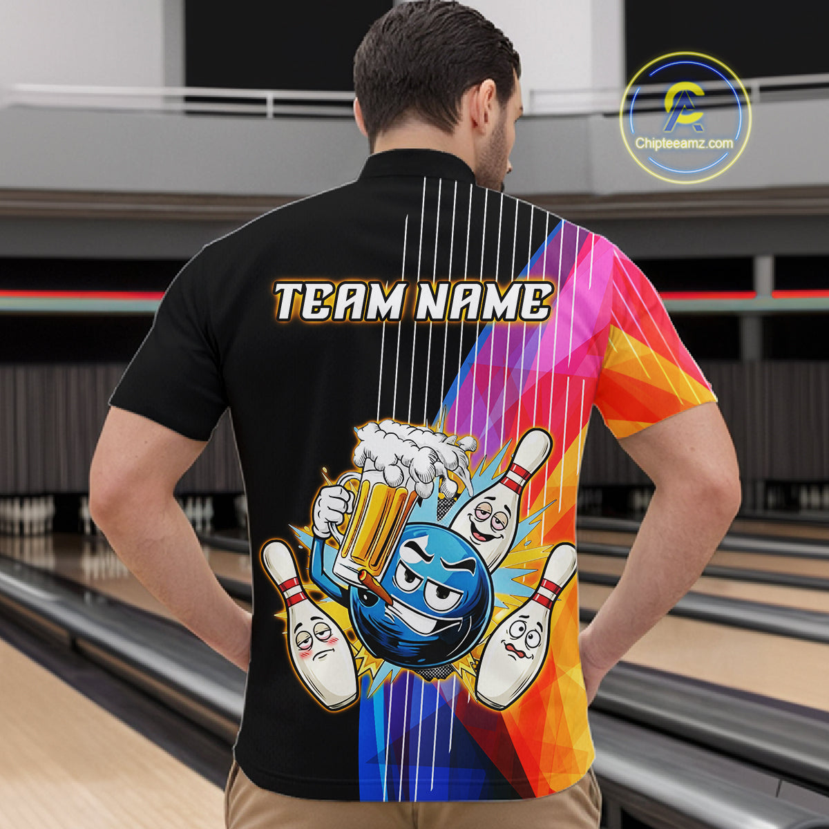 Person wearing a colorful bowling-themed shirt with 'TEAM NAME' text in a bowling alley.