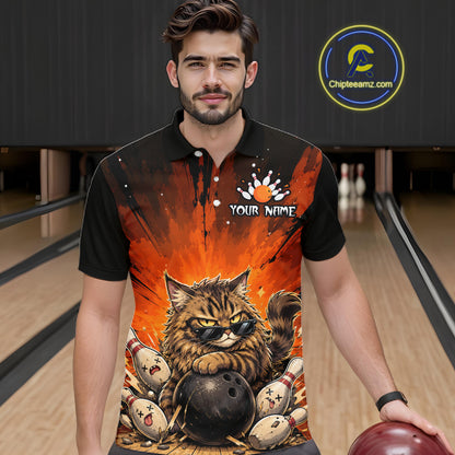 Man wearing a bowling-themed shirt with a cat design in a bowling alley.