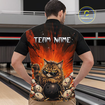 Person wearing a bowling-themed shirt with a cat design in a bowling alley.