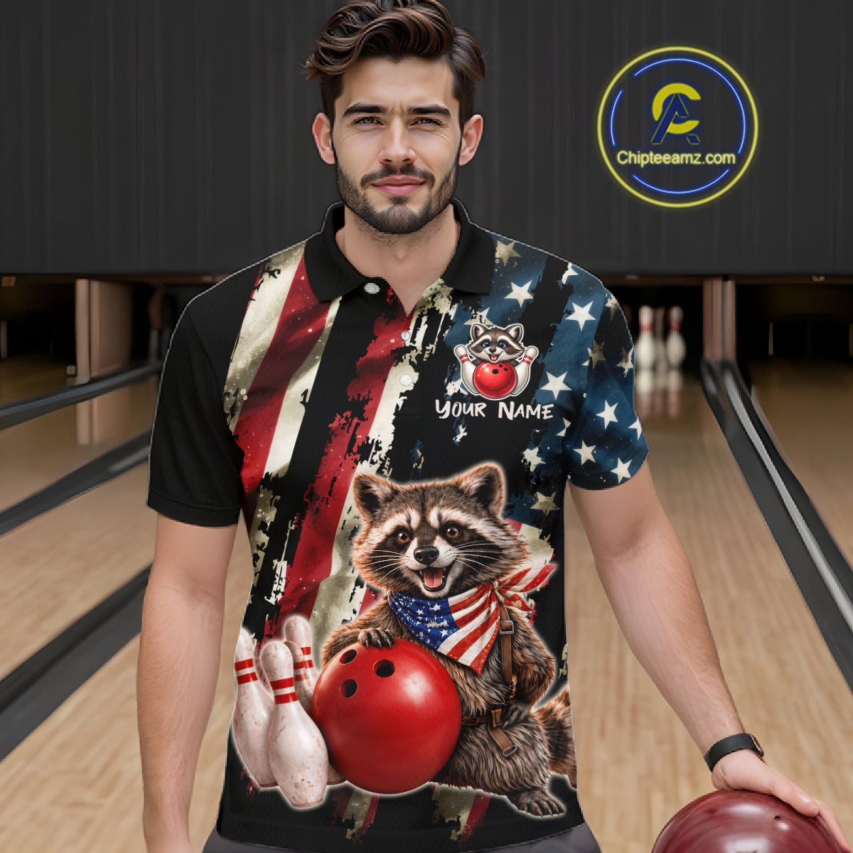 Man wearing a colorful polo shirt with a raccoon design in a bowling alley.