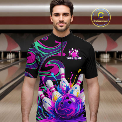 Man wearing a colorful bowling-themed shirt with a personalized design in a bowling alley.