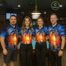 Load image into Gallery viewer, Four people wearing matching blue and orange shirts with a sunset design in a bar setting.