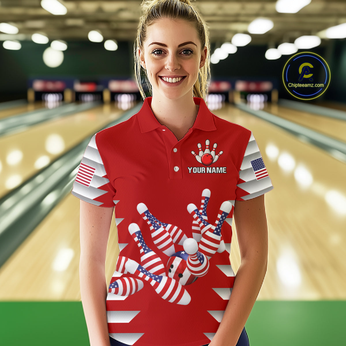Female model wearing a custom red patriotic bowling polo shirt front view featuring American flag bowling pins, bowling ball and stars and stripes artwork at the bowling alley