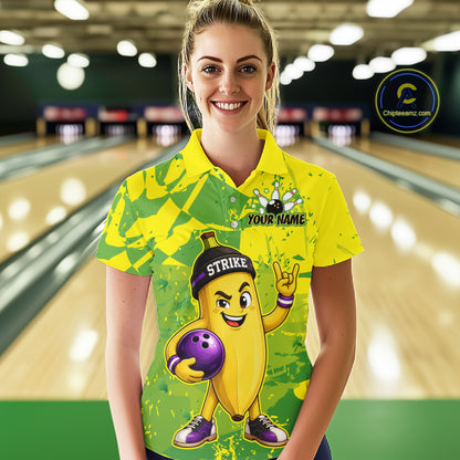 A woman wearing custom yellow banana bowling polo shirt front view featuring a funny cartoon fruit and bowling ball, displaying Your Name, at the bowling alley