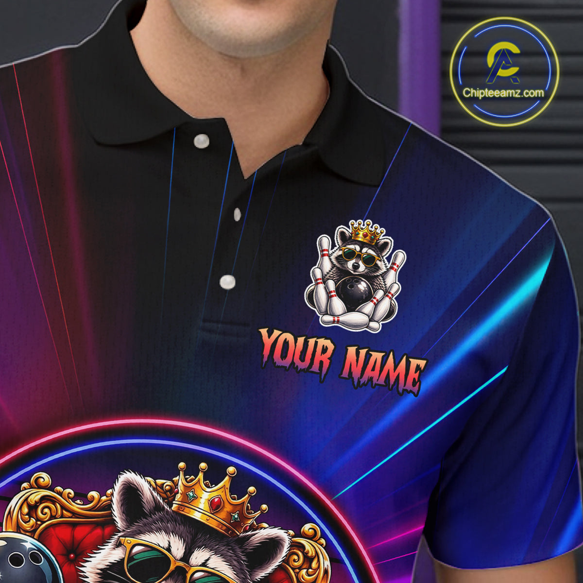 Person wearing a blue and black neon polo shirt with a raccoon graphic and 'Your Name' text on a dark background.