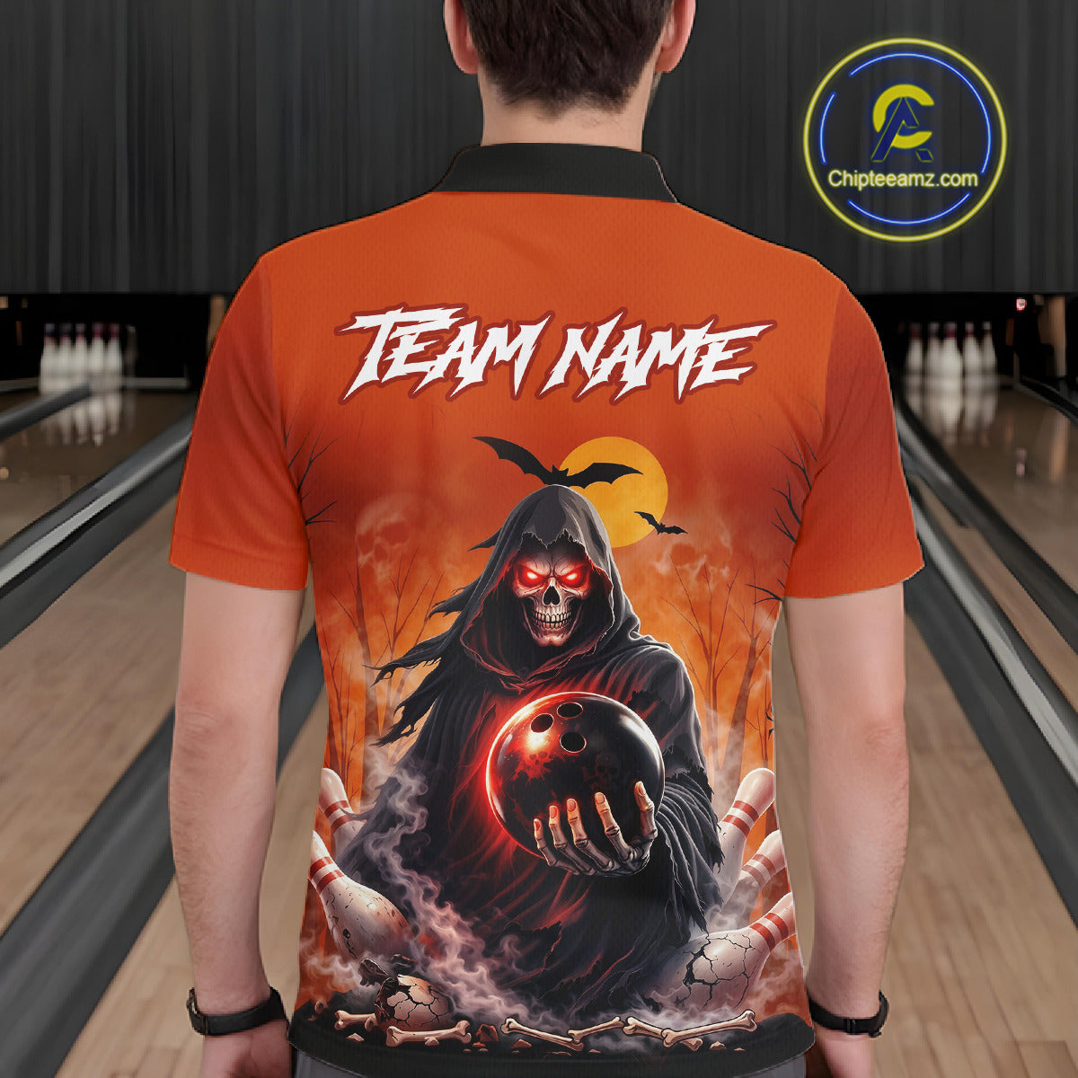 Male model wearing a custom orange grim reaper bowling polo shirt back view displaying the personalized team name above a hooded grim reaper artwork at the bowling alley