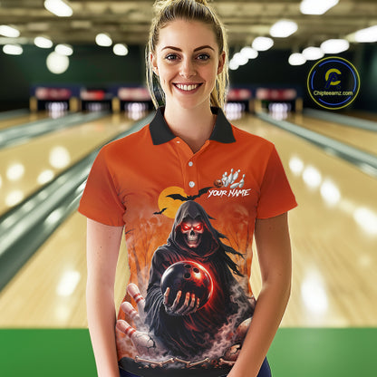 Female model wearing a custom orange grim reaper bowling polo shirt front view featuring a hooded grim reaper, glowing bowling ball, fiery smoke effect and sunset background at the bowling alley