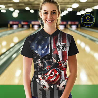Person wearing a colorful t-shirt with graphics in a bowling alley