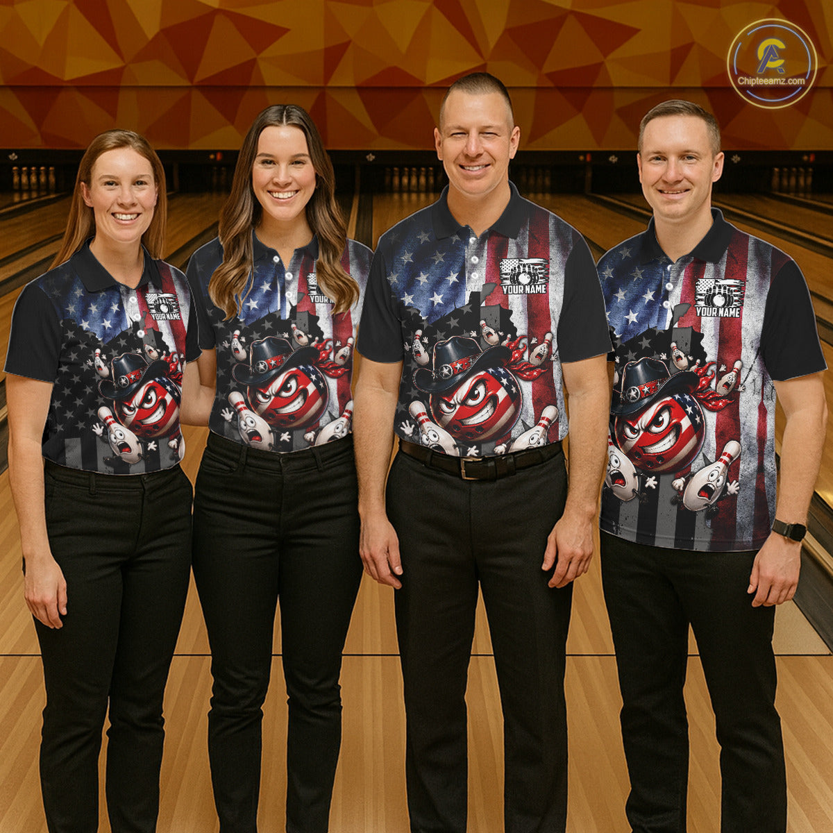 Four people wearing matching bowling shirts in a bowling alley.