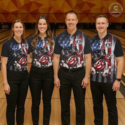 Four people wearing matching bowling shirts in a bowling alley.