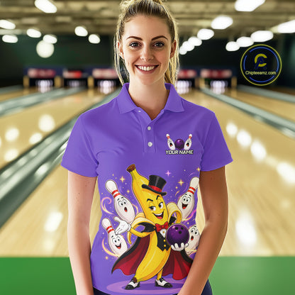 Woman wearing a purple bowling-themed shirt with cartoon characters in a bowling alley.