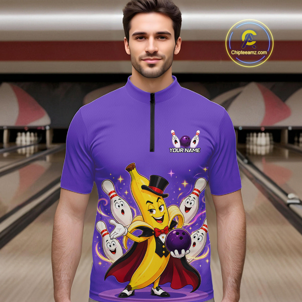 Man wearing a purple shirt with a cartoon character design in a bowling alley.