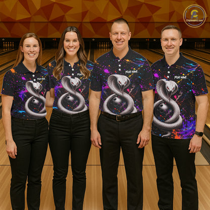 Four people wearing matching bowling shirts with a snake design on a bowling alley.