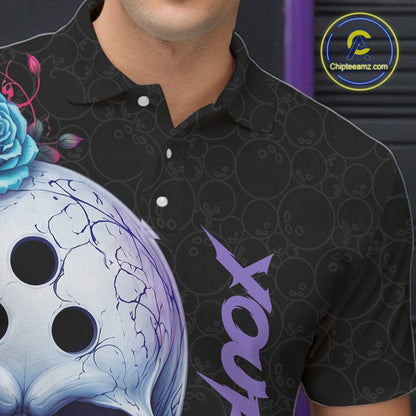 Person wearing a black polo shirt with a graphic design and customizable text.