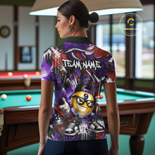 Load image into Gallery viewer, Person wearing a colorful polo shirt with a smiley billiard ball design in a pool hall.