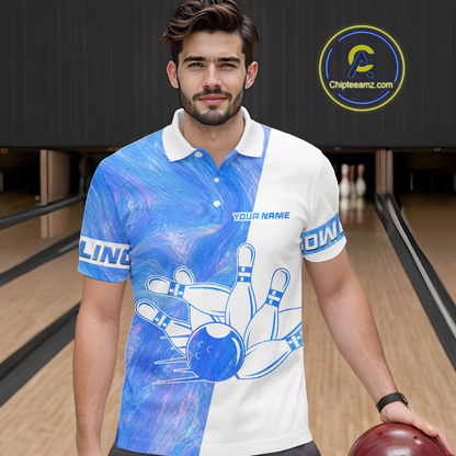 Man wearing a blue and white bowling-themed shirt with a bowling ball in a bowling alley.