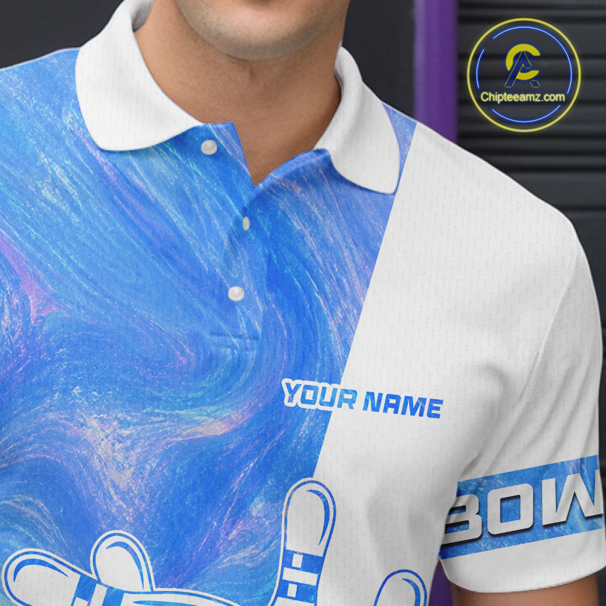 Close-up of a person wearing a blue and white polo shirt with personalized text.