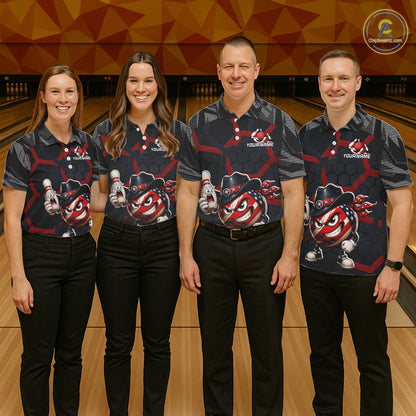 Four people wearing matching bowling shirts in a bowling alley.