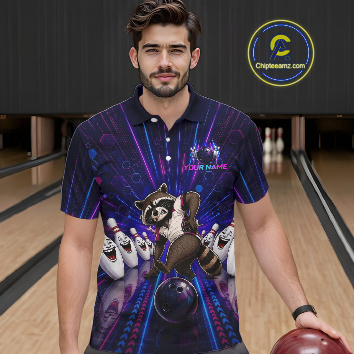 Man wearing a colorful bowling-themed shirt with a raccoon graphic in a bowling alley.