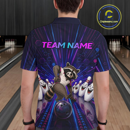 Person wearing a bowling-themed shirt with a raccoon and bowling pins design in a bowling alley.