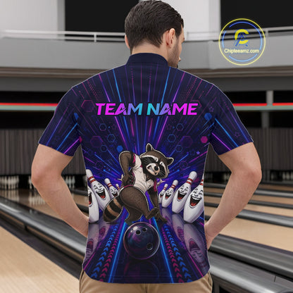Person wearing a colorful bowling shirt with a raccoon graphic and 'Team Name' text in a bowling alley.