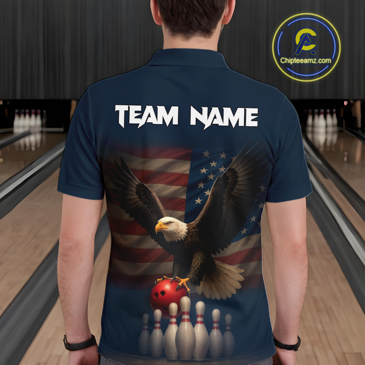Man wearing custom navy patriotic bowling polo shirt back view featuring a bald eagle and American flag, displaying Team Name, at the bowling alley