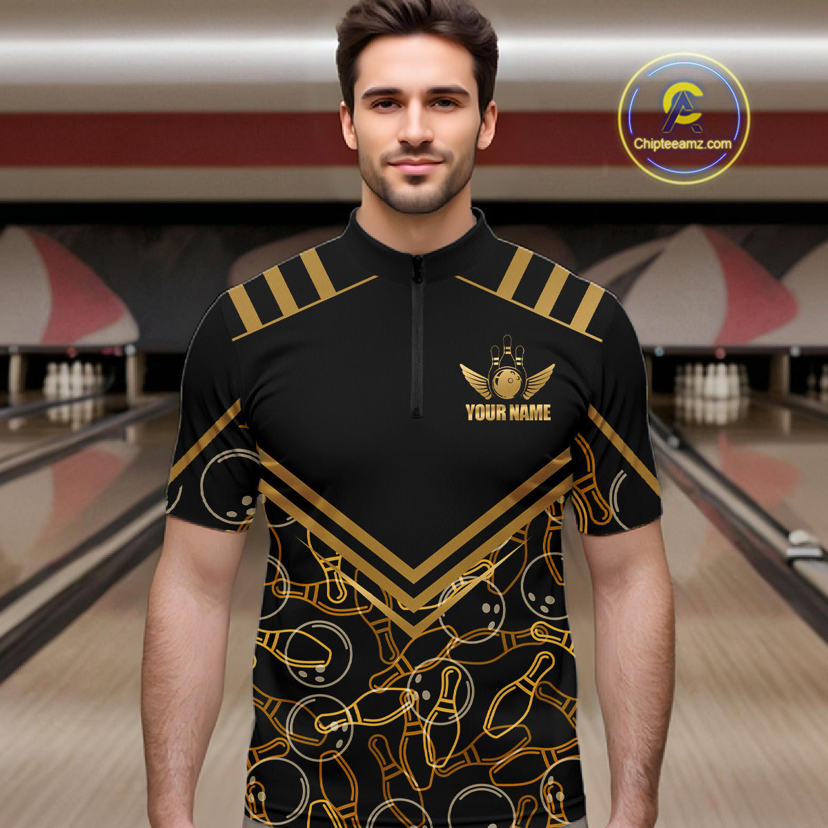 Male model wearing a custom black gold bowling quarter-zip shirt front view featuring a golden winged bowling ball emblem, geometric line pattern and premium black gold design at the bowling alley