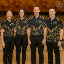 Load image into Gallery viewer, Group of four wearing custom black gold bowling shirts front view featuring golden winged bowling ball artwork with geometric line pattern at the bowling alley