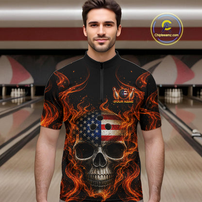 Man wearing a black bowling shirt with a skull and flames design in a bowling alley.