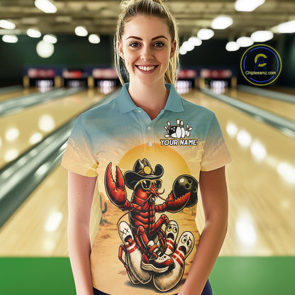 Person wearing a custom bowling shirt with a crawfish design in a bowling alley.
