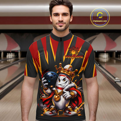 Man wearing a bowling-themed shirt with graphics and text in a bowling alley.
