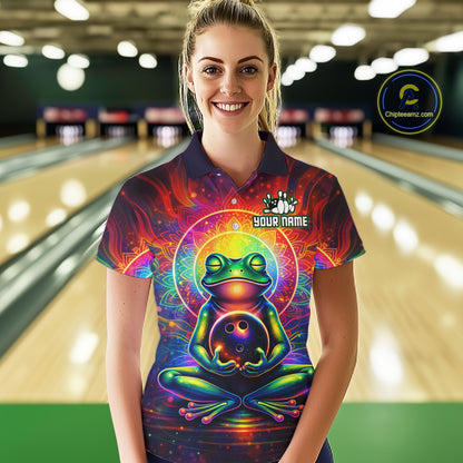 Female model wearing a custom zen frog bowling polo shirt front view featuring a vibrant neon frog, bowling ball, glowing cosmic background and colorful psychedelic pattern at the bowling alley