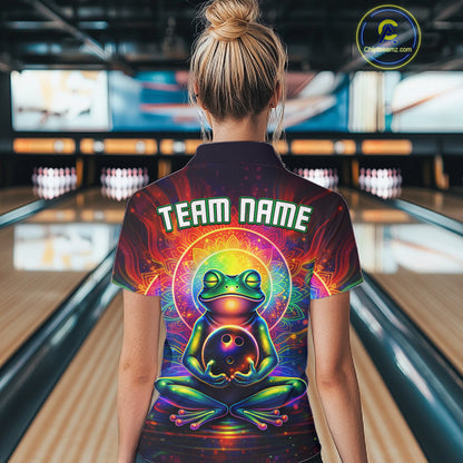 Female model wearing a custom zen frog bowling quarter-zip shirt back view displaying the personalized team name above a vibrant neon frog artwork at the bowling alley