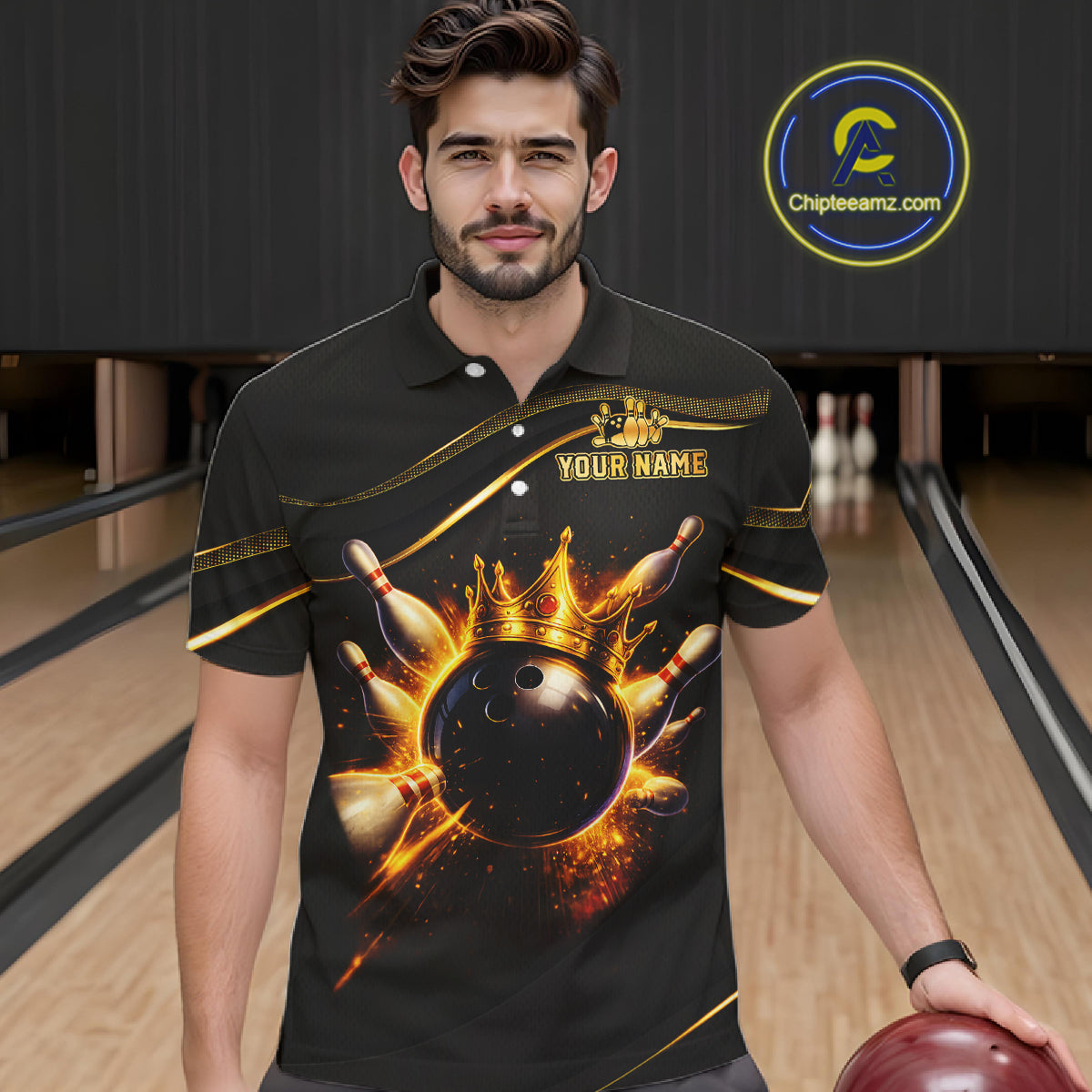 Man wearing custom black gold bowling polo shirt front view featuring a fiery bowling ball and flame burst effect, displaying Your Name, at the bowling alley